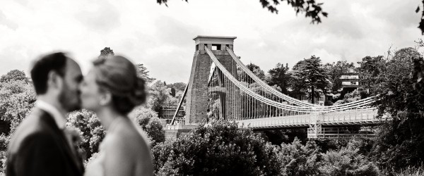 Bride & groom in front of the Clifton Suspension bridge