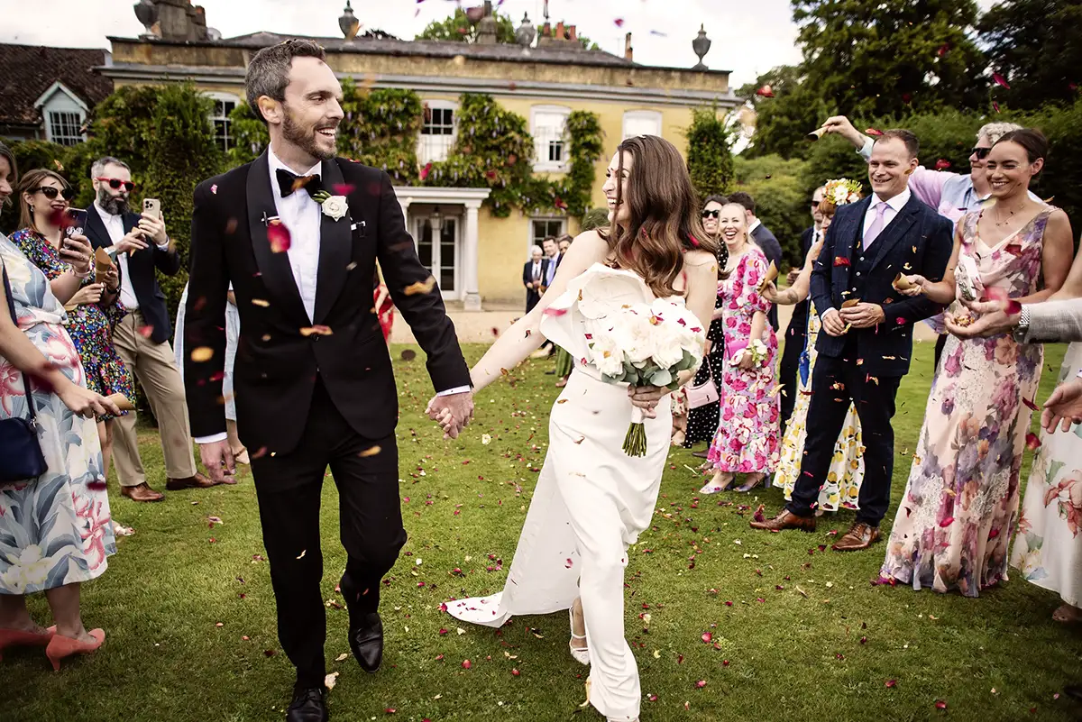 A bride & groom candid confetti moment
